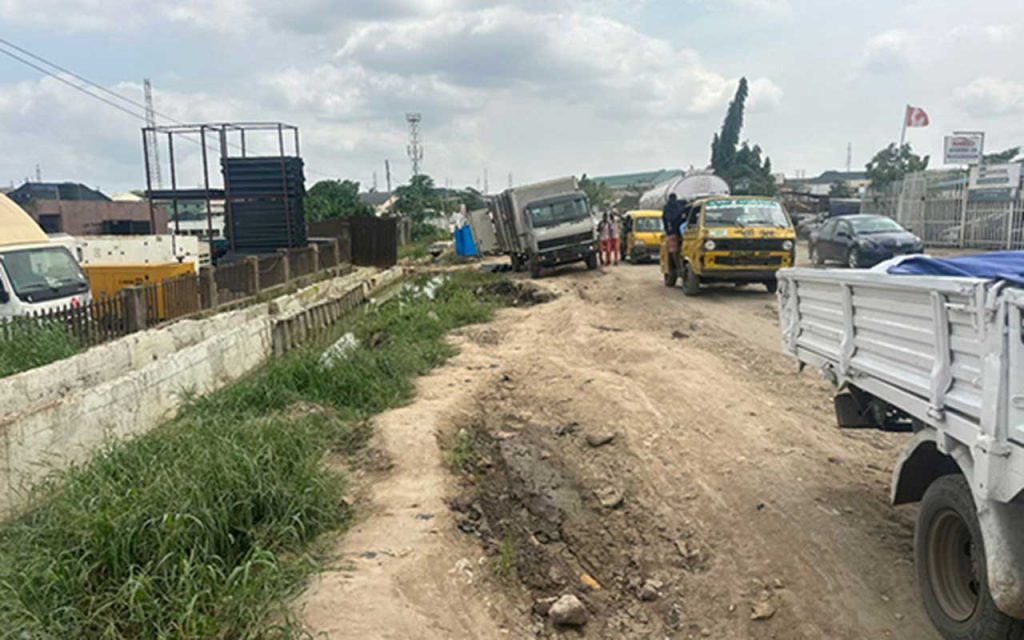 Motorists, residents lament delay in Isolo-NNPC Road repair 14 months after